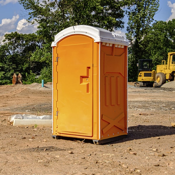 what is the cost difference between standard and deluxe portable restroom rentals in Jud